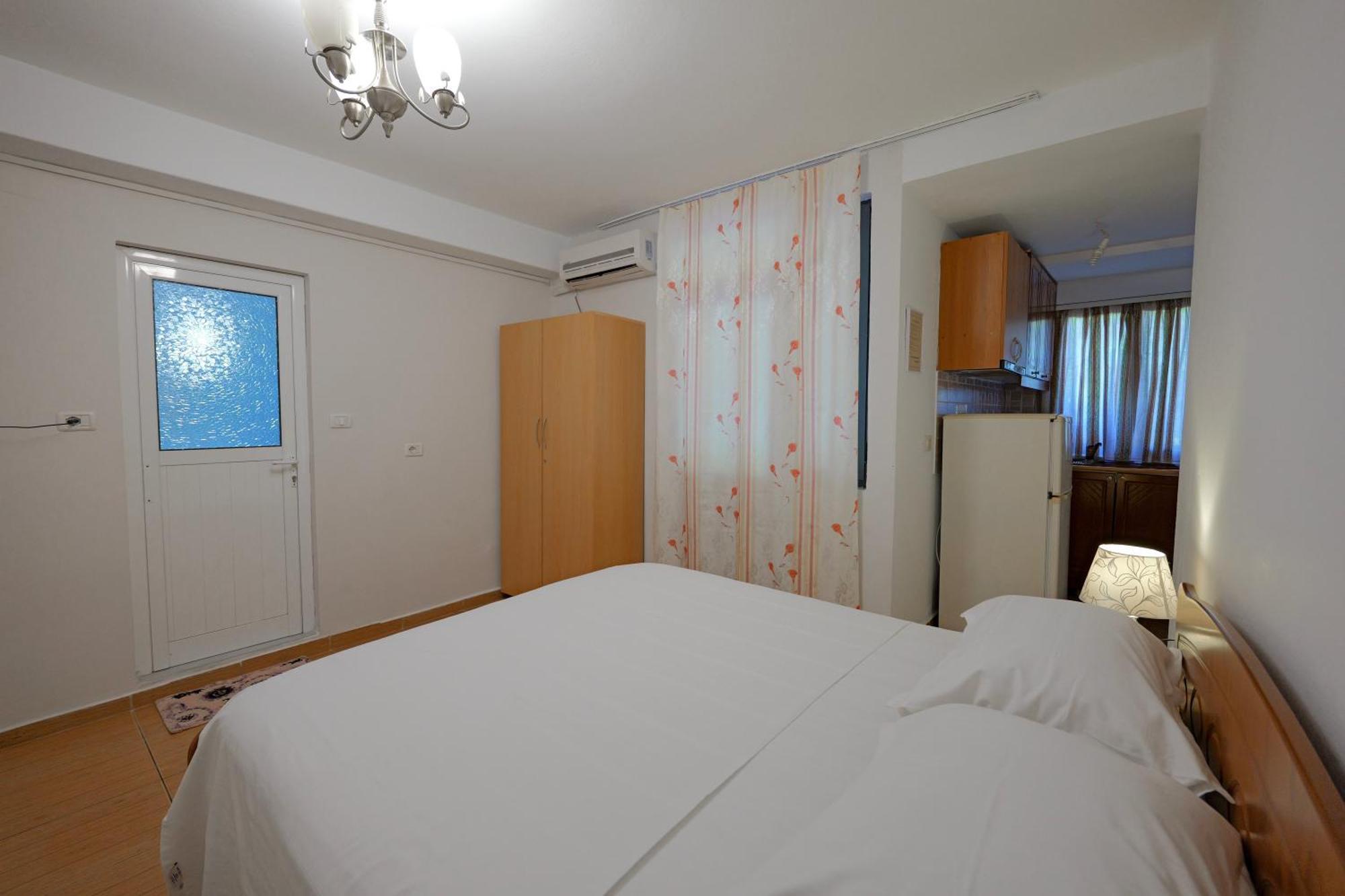 Vila En Ad Aparthotel Ксамил Екстериор снимка